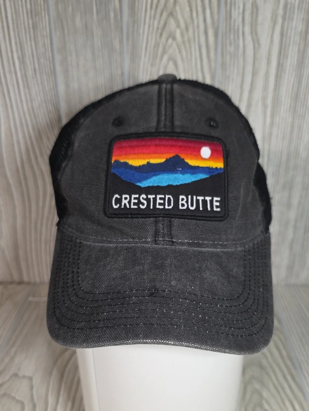 Legacy Crested Butte Faded Black Retro Style Trucker Hat With Patch